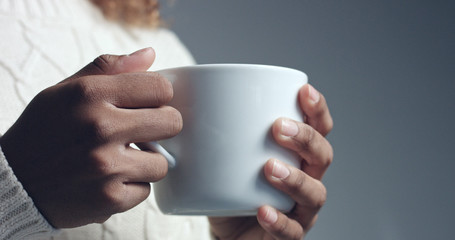 Pretty black girl with big hair posing video. feel freeze. cold season concept
