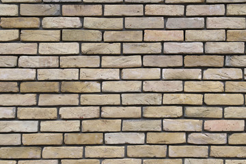 yellow cracked brickwork