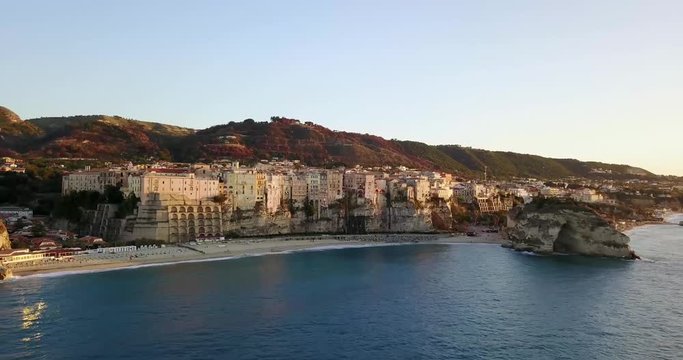 Aerial, drone view of the town Tropea in Calabria. Coast at the evening, sunset time.