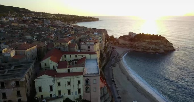 Aerial, drone view of the town Tropea in Calabria. Coast at the evening, sunset time.