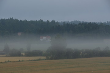 Fototapeta premium morning fog over the farm
