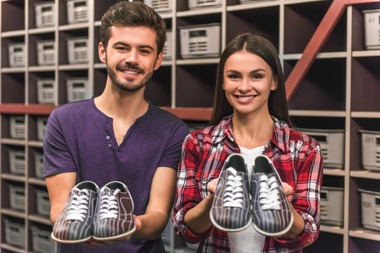 Couple with bowling shoes