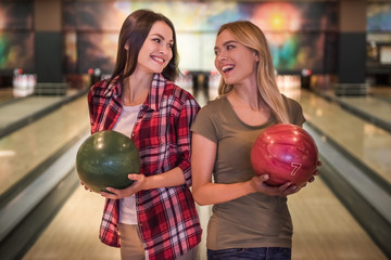 Girls playing bowling