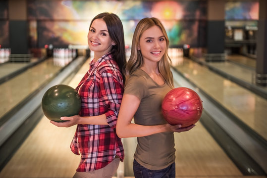 Girls playing bowling