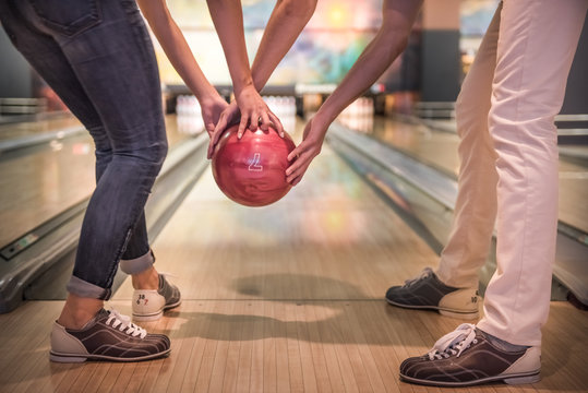 Couple Playing Bowling