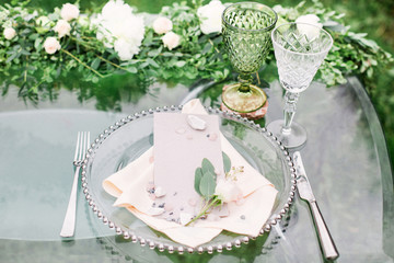 Table setting with dishes and floristic