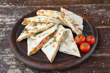 country pita with cheese, meat and  fish