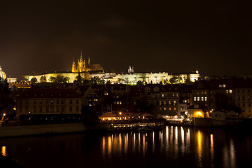 Fototapeta na wymiar Night panorama of Prague, Czech Republic. Castle, St Vitus Cathedral and Vltava river