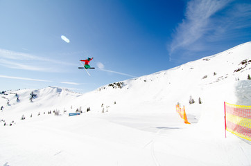 Man is flying by ski at skipark