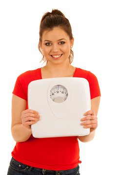 woman holding a scale isolated over white background