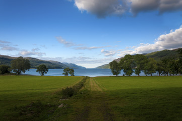 Fototapeta na wymiar Beatiful and serene landscape of the Loch Ness in Scotland, United Kingdom