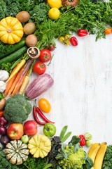Top view of rainbow vegetables, fruits, copy space