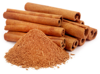 Bunch of some fresh aromatic cinnamon with powder spice