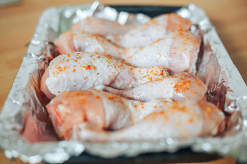 Baking sheet with chicken legs