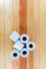 White tissues paper or toilet paper on wooden table.