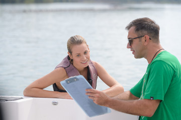 young pretty woman happy with her waterski result
