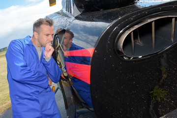 Man assessing aircraft