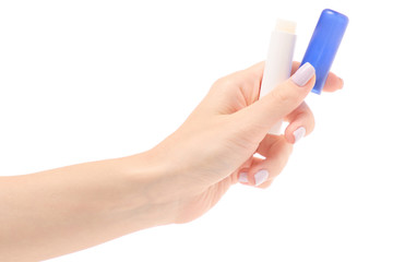 Female hand hygienic lip balm