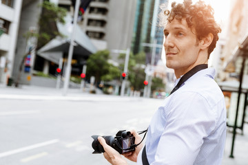 Male photographer taking picture