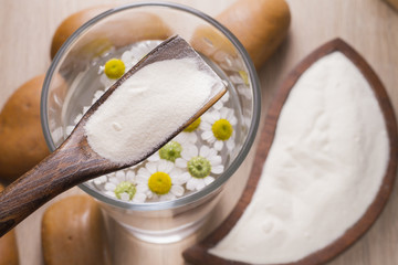 Hydrolyzed Collagen Protein on Wood Background
