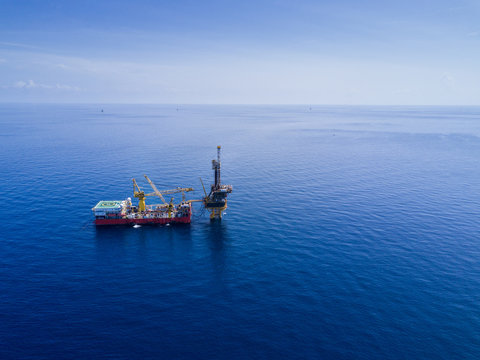 Aerial View of Tender Drilling Oil Rig (Barge Oil Rig) in The Middle of The Ocean