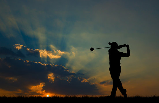 silhouette golfer playing golf during beautiful sunset