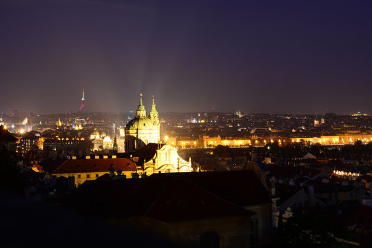 Night cityscape of Prague old town and St. Nicholas Church in Malá Strana district