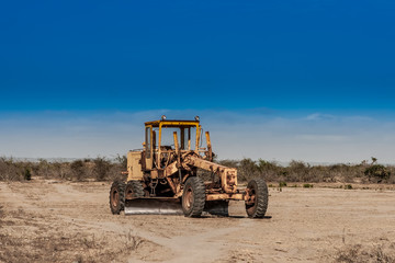 Grader. Road engineering. An old grader.