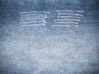  ripped torn pattern of blue denim jeans texture and background