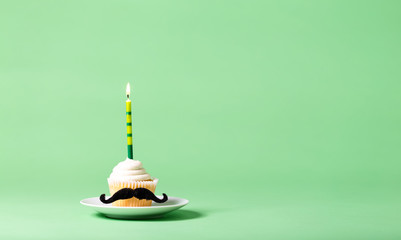 Cupcake with a moustache in Father's Day theme