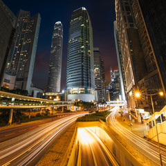 Fototapeta na wymiar Hong Kong at night, Light trail with modern building in backgrounds
