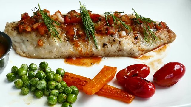 Sea bass steak with sauce
