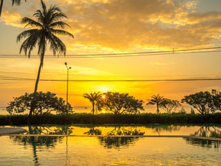 Twilight sunrise sky at sea with pool