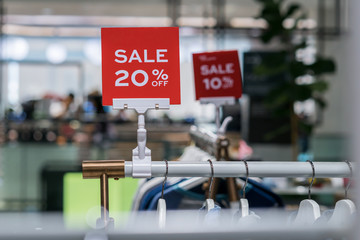 sale 20% off mock up advertise display frame setting over the clothes line in the shopping department store for shopping, business fashion and advertisement concept