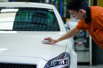 Hand Polishing By Clay Bar.