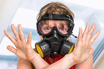 Business woman with gas mask showing negative gesture