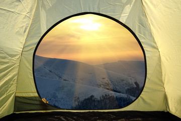 View from inside a tent on mountains landscape