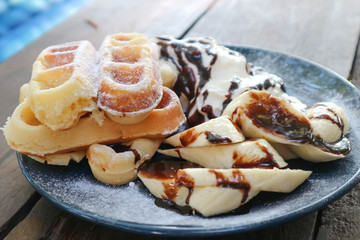 waffle with banana and whipped cream