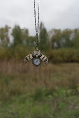 Clock sofa suspension in the woods