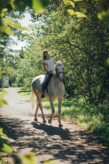 Girl and horse in the woods