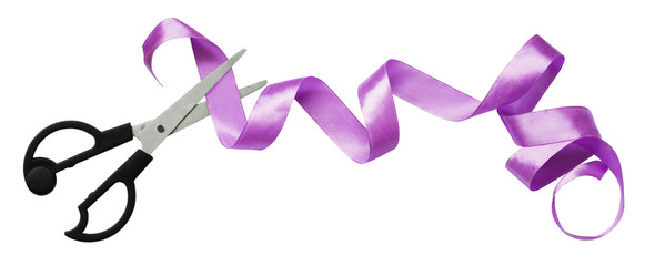 Curled violet silk ribbon and scissors