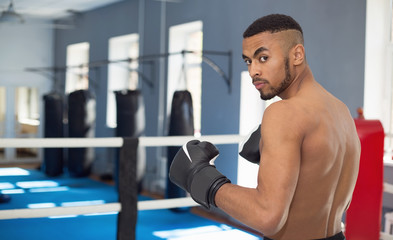 Fototapeta na wymiar African american man in the gym for boxing.