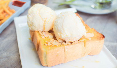 Dessert honey toast with ice cream after lunch ,sweet and relax concept.
