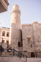 Minaret of Muhammad Mosque in Old city, Icheri Sheher is the historical core of Baku. Baku, Azerbaijan - September 20, 2017