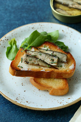 Sandwich with smoked sardines