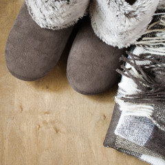 Warm home clothes. Woolen plaid and home slippers.