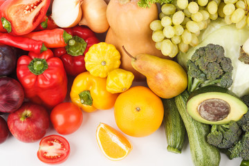 Set of multicolored fresh raw vegetables and fruits, isolated