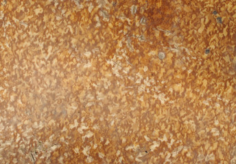 Texture of aged brown dotted linoleum