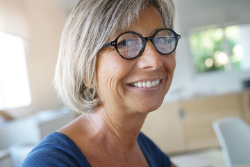 Portrait of senior woman with eyeglasses on