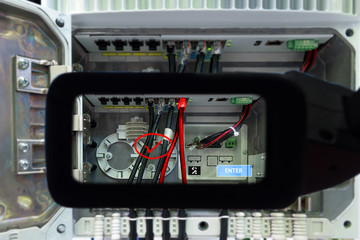 Industrial 4.0 , smart helmet technology concept. Augmented reality glasses service. Engineering monitoring ,maintenance and setup control box to ensure accurate operation in smart factory background